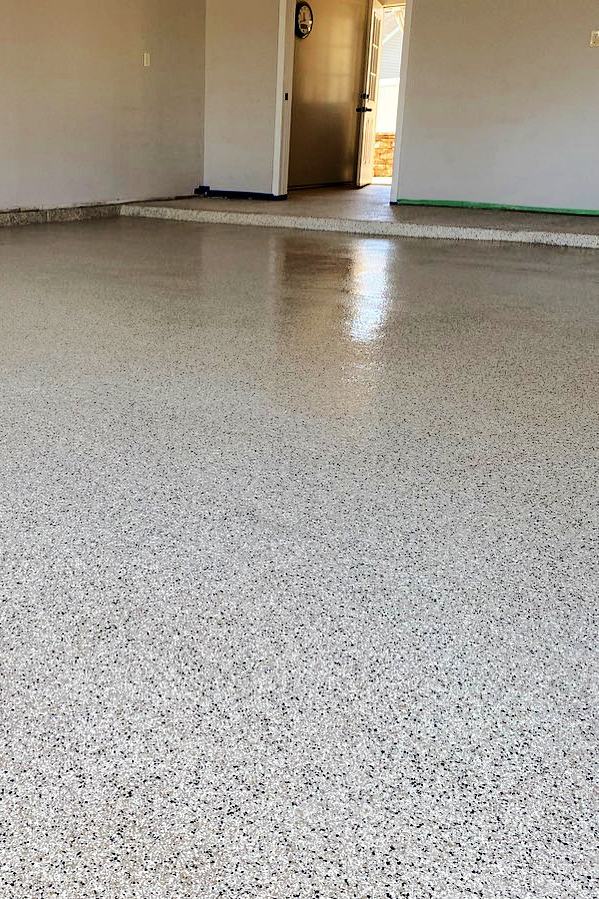 Light flake epoxy garage floor, bright daylight