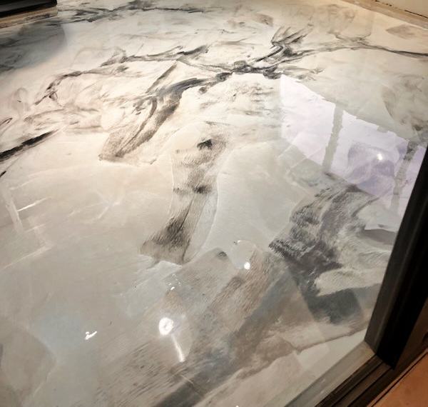 White and grey marbled metallic epoxy floor